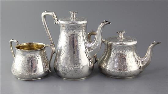 A Victorian silver three piece tea/coffee set by Daniel & Charles Houle, gross 62 oz.